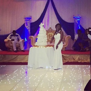 bride with wedding cake